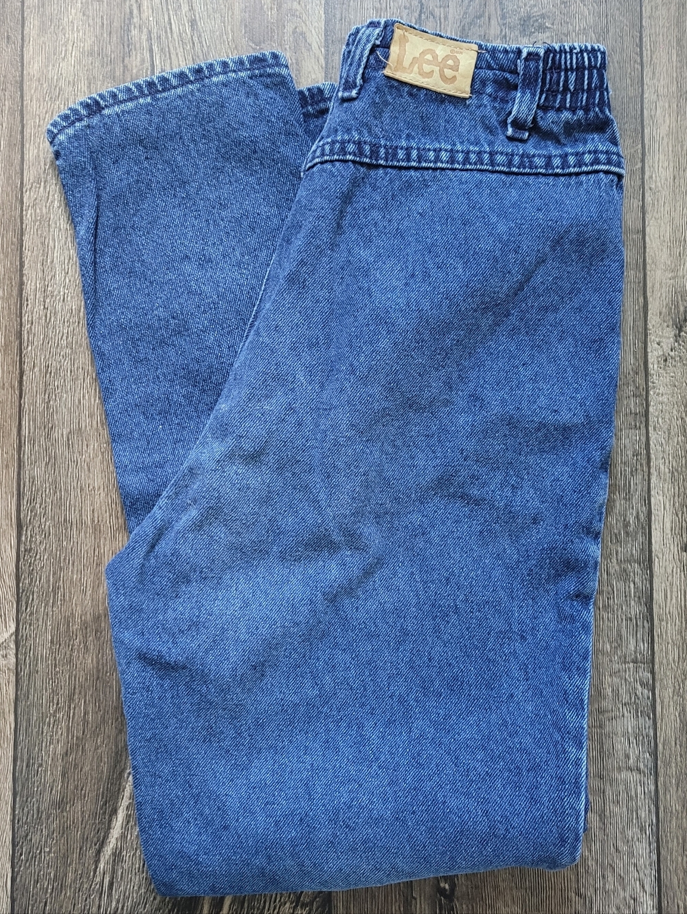 Vintage Lee blue denim jeans with elastic waistband.